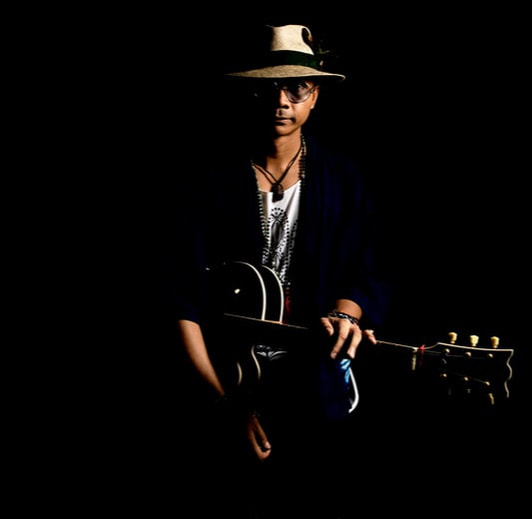 Mellow Blues is a guitarist and singer-songwriter whose music incorporates elements of blues, jazz, bossa nova and psychedelic. He conducts remote online blues, rock and jazz guitar lessons via Skype, Zoom and Microsoft Teams video calls.