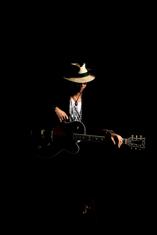 Mellow Blues is a guitarist and singer-songwriter whose music incorporates elements of blues, jazz and folk. He conducts remote online blues, rock and jazz guitar lessons via Skype, Zoom and Microsoft Teams video calls.
