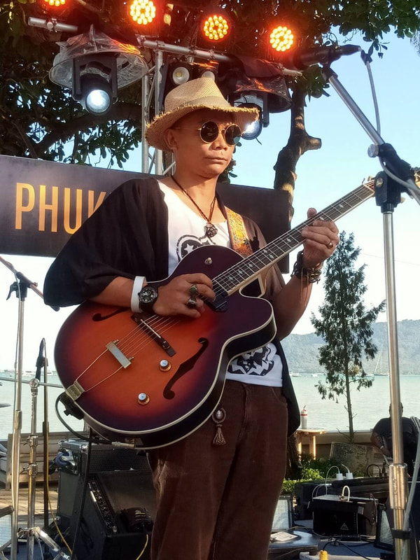 Mellow Blues, a guitarist and singer-songwriter, plays a blend of Blues, Jazz and Folk. Live at the International Jazz N Blues Phuket Thailand 2023.