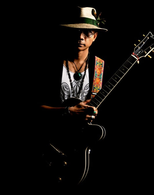 Mellow Blues is a blues, jazz, folk and bossa nova guitarist and singer-songwriter from Singapore based in Phuket, Thailand. He conducts Online Blues, Rock N Jazz Guitar Lessons via Skype, Zoom and Microsoft Teams video call.