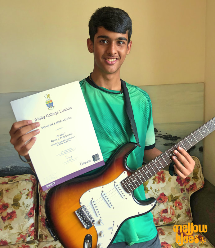 Mellow Blues Guitar Lessons in Singapore Online Guitar Lesson Trinity Rock n Pop Grading Exam Student
